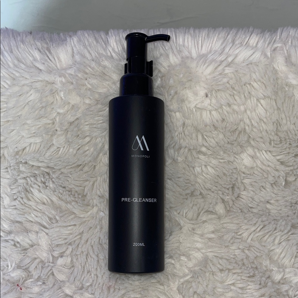Monopoli Pre-Cleanser - Black Bottle with cleansers in the bottle still sealed